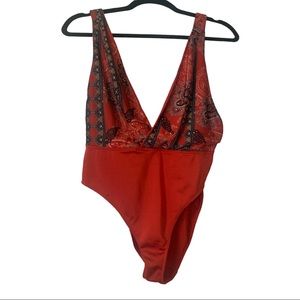 Urban outfitters out from under bodysuit in red design, size medium. Worn ONCE.